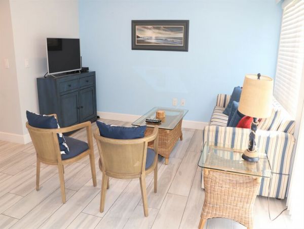Walk to South Village from this bayside condo