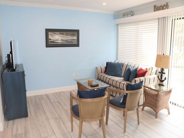 Walk to South Village from this bayside condo