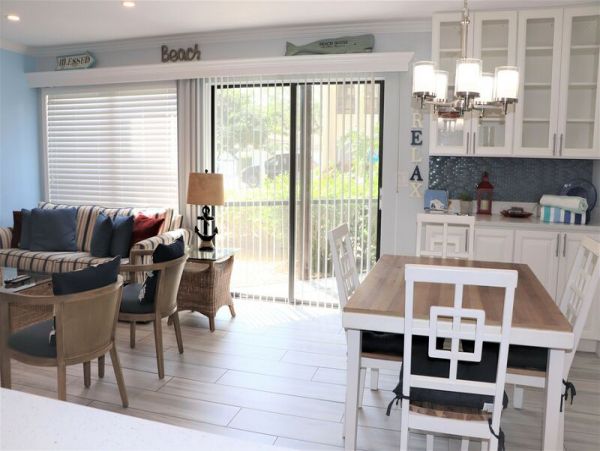 Walk to South Village from this bayside condo