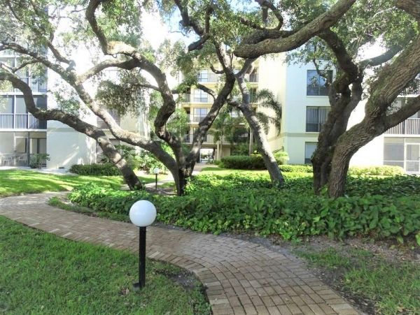 Walk to South Village from this bayside condo