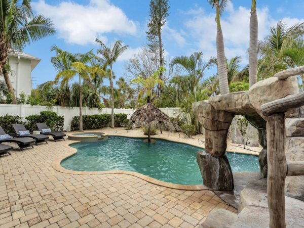 Luxurious Island Retreat with Private Pool, Game Room and Rooftop Deck in Holmes Beach