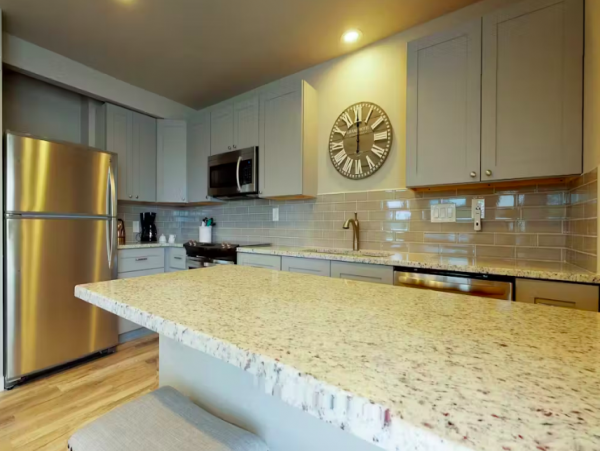 Bayside Condo with heated Pool- Across the street from the Beach