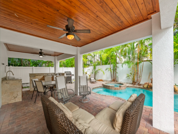 Island Oasis with Pool, Hut Tub, and Rooftop Deck, Steps from Manatee Beach