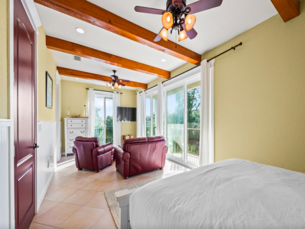 Island Oasis with Pool, Hut Tub, and Rooftop Deck, Steps from Manatee Beach