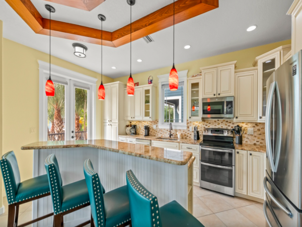 Island Oasis with Pool, Hut Tub, and Rooftop Deck, Steps from Manatee Beach
