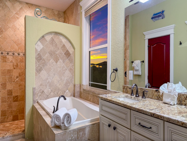 Island Oasis with Pool, Hut Tub, and Rooftop Deck, Steps from Manatee Beach