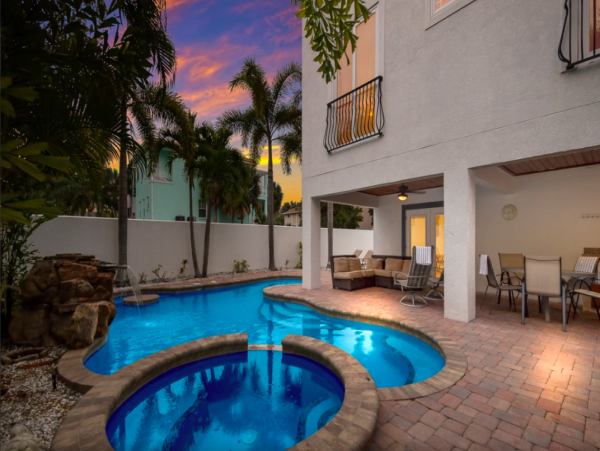 Island Oasis with Pool, Hut Tub, and Rooftop Deck, Steps from Manatee Beach