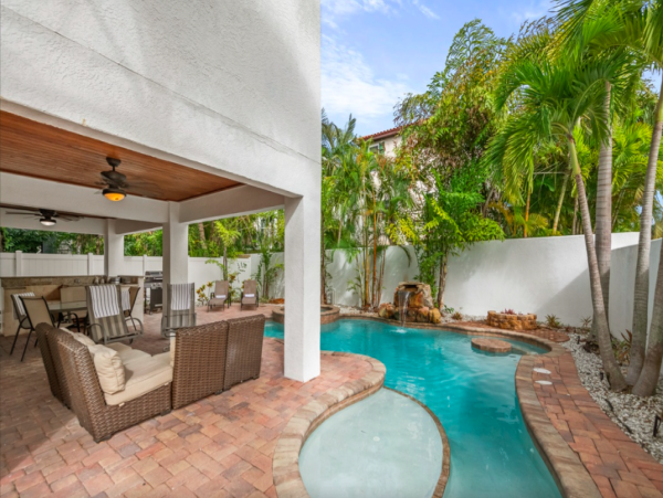 Island Oasis with Pool, Hut Tub, and Rooftop Deck, Steps from Manatee Beach