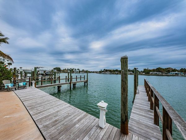 Treasure Island Waterfront Vacation Rental Luxury Intracoastal Condo with Pool & Docks