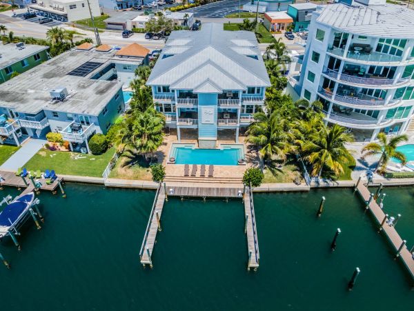 Treasure Island Waterfront Vacation Rental Luxury Intracoastal Condo with Pool & Docks