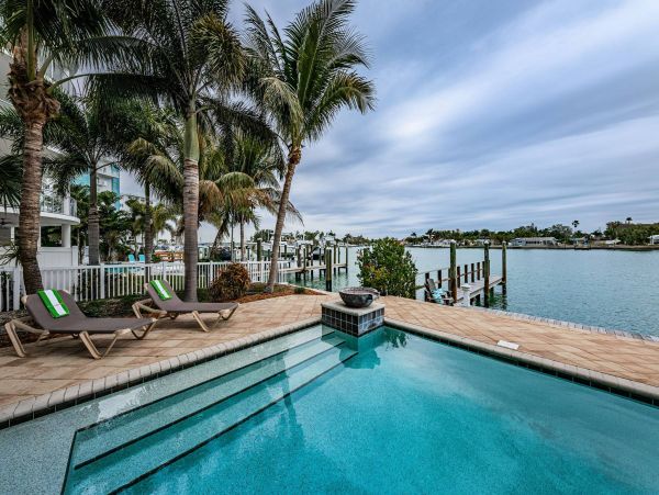 Treasure Island Waterfront Vacation Rental Luxury Intracoastal Condo with Pool & Docks