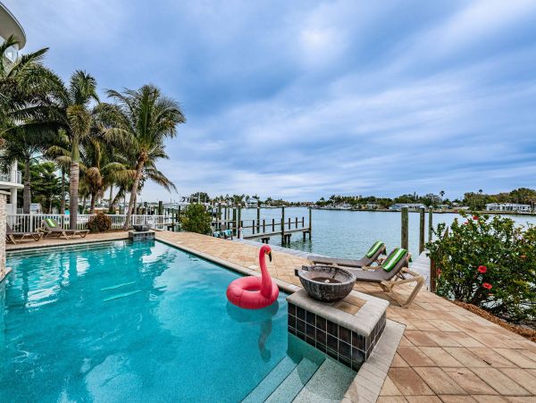 Treasure Island Waterfront Vacation Rental Luxury Intracoastal Condo with Pool & Docks