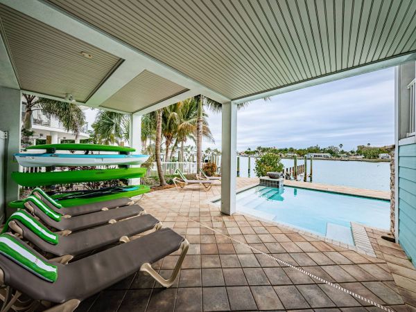 Treasure Island Waterfront Vacation Rental Luxury Intracoastal Condo with Pool & Docks