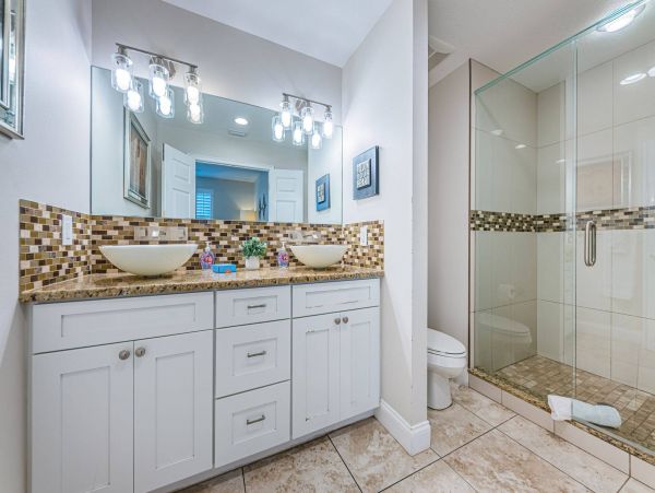 Treasure Island Waterfront Vacation Rental Luxury Intracoastal Condo with Pool & Docks