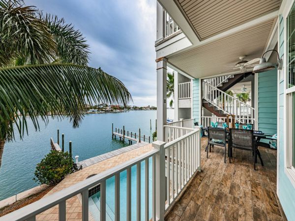 Treasure Island Waterfront Vacation Rental Luxury Intracoastal Condo with Pool & Docks