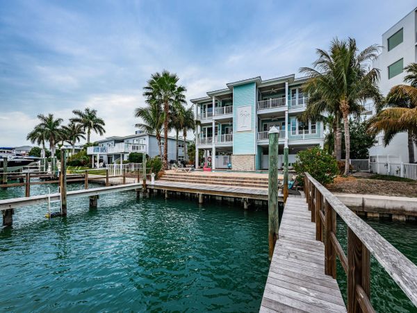 Treasure Island Waterfront Vacation Rental Luxury Intracoastal Condo with Pool & Docks
