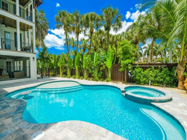 St. Armands Vacation Rental | Luxury 7-Bedroom Home with Pool Near Lido Key