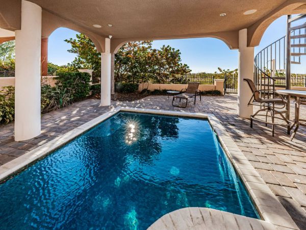 Treasure Island Beachfront Vacation Rental Luxury 5-Bedroom Gulf Coast Home with Pool