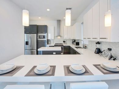 Luxury Four Bedroom Townhome with Shared Pool & Gym Access