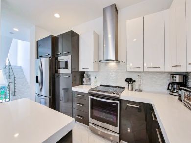 Luxury Four Bedroom Townhome with Shared Pool & Gym Access