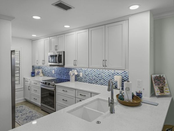 Coastal Elegance: Renovated 2-Bedroom Condo Right On the Beach
