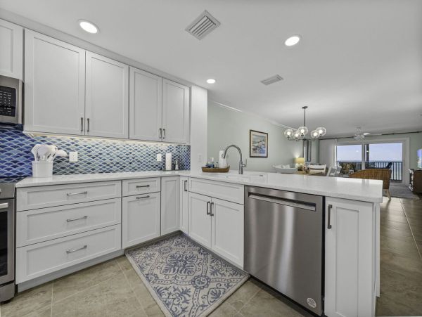 Coastal Elegance: Renovated 2-Bedroom Condo Right On the Beach