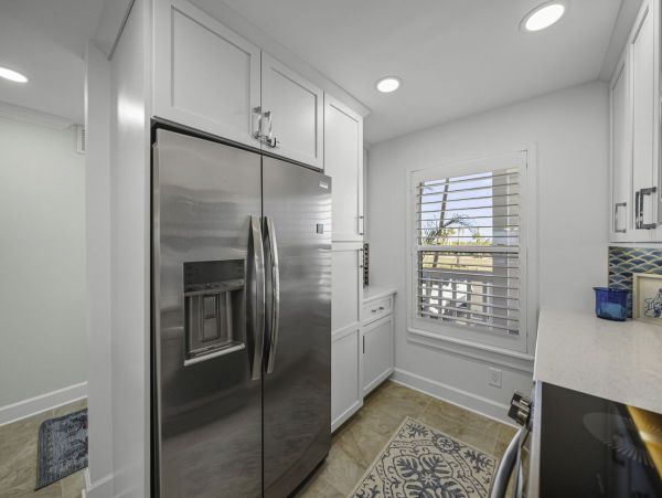 Coastal Elegance: Renovated 2-Bedroom Condo Right On the Beach