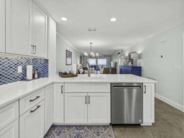 Coastal Elegance: Renovated 2-Bedroom Condo Right On the Beach