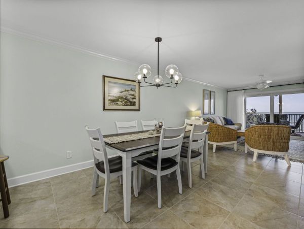 Coastal Elegance: Renovated 2-Bedroom Condo Right On the Beach