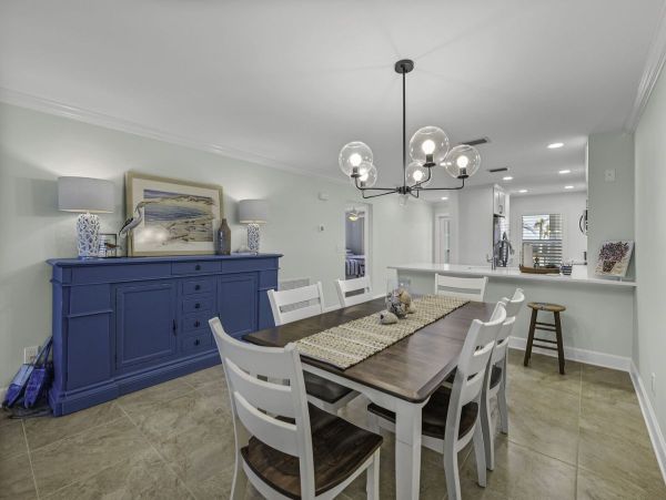Coastal Elegance: Renovated 2-Bedroom Condo Right On the Beach