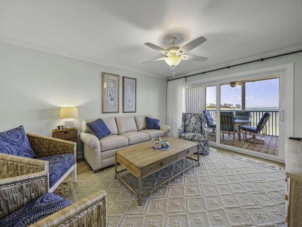 Coastal Elegance: Renovated 2-Bedroom Condo Right On the Beach