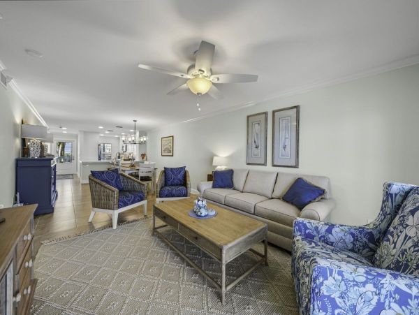 Coastal Elegance: Renovated 2-Bedroom Condo Right On the Beach