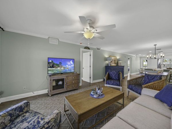 Coastal Elegance: Renovated 2-Bedroom Condo Right On the Beach