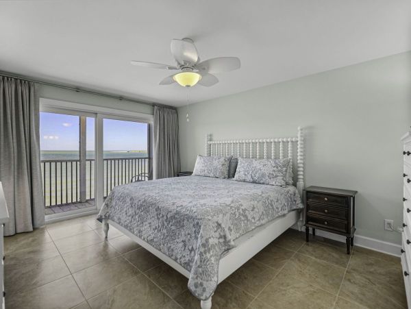 Coastal Elegance: Renovated 2-Bedroom Condo Right On the Beach