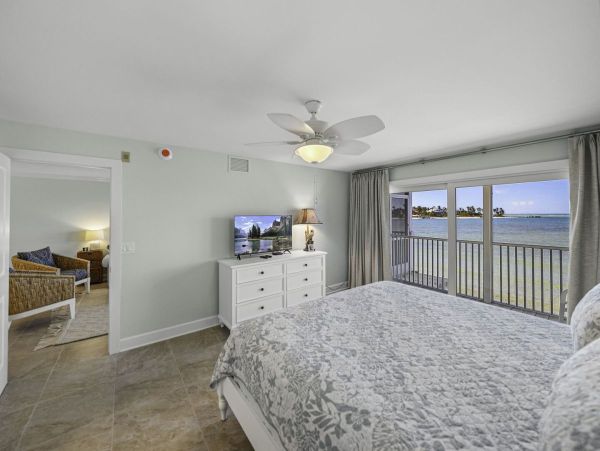 Coastal Elegance: Renovated 2-Bedroom Condo Right On the Beach