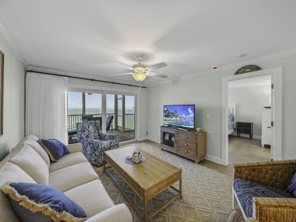 Coastal Elegance: Renovated 2-Bedroom Condo Right On the Beach