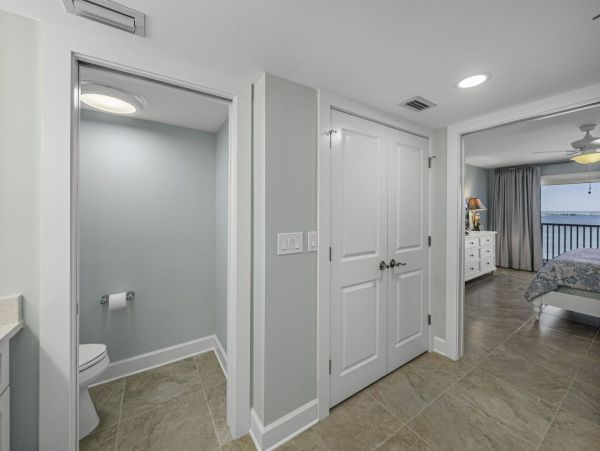 Coastal Elegance: Renovated 2-Bedroom Condo Right On the Beach
