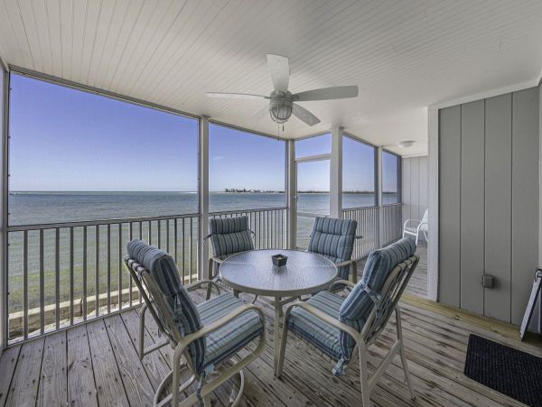 Coastal Elegance: Renovated 2-Bedroom Condo Right On the Beach