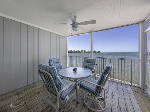 Coastal Elegance: Renovated 2-Bedroom Condo Right On the Beach