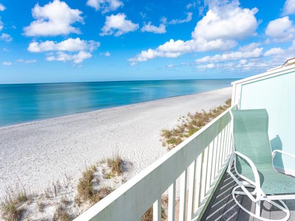 Spacious Two-story Townhome Beachfront with Shared Pool & Tennis Court