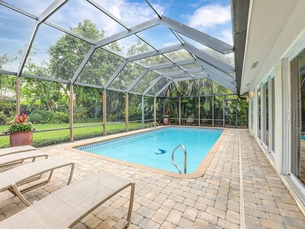 Naples Walk to Beach 4 Bedroom Rental Home with Caged Pool