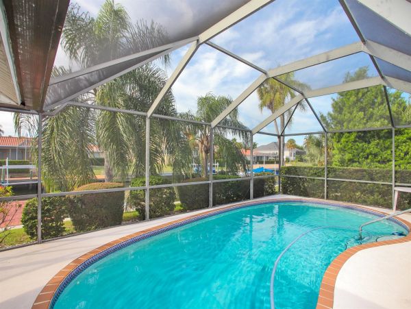 European Style Canal Front Home with Private Beach Access