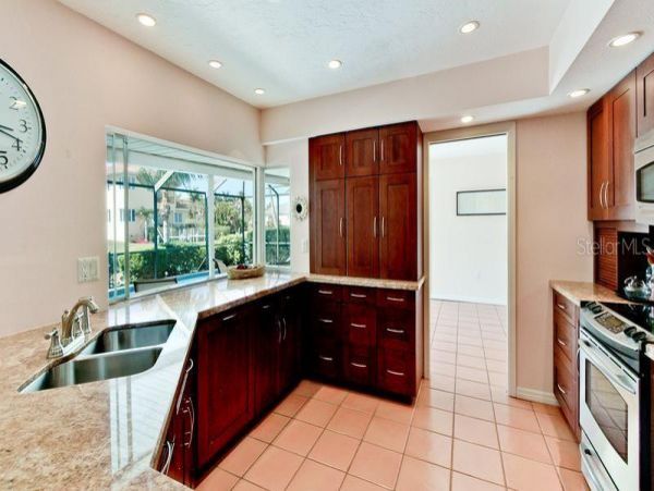 European Style Canal Front Home with Private Beach Access