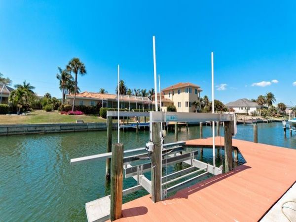 European Style Canal Front Home with Private Beach Access