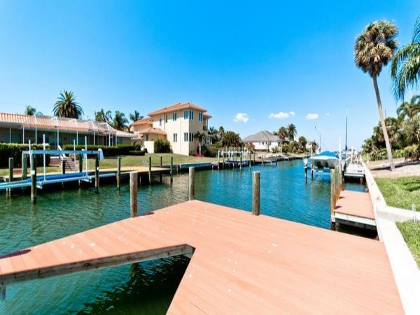European Style Canal Front Home with Private Beach Access