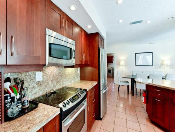 European Style Canal Front Home with Private Beach Access