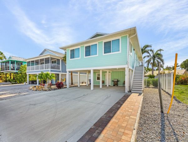 Fort Myers Beach Luxury Vacation Rental  4-Bedroom Private Home with Heated Pool & Spa
