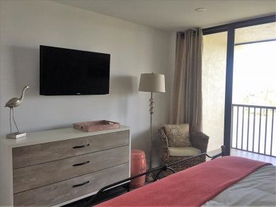 Sweeping Views From This 2 Bedroom High Rise in Naples