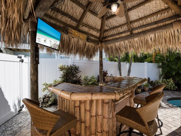 Tiki Cottage steps from the beach