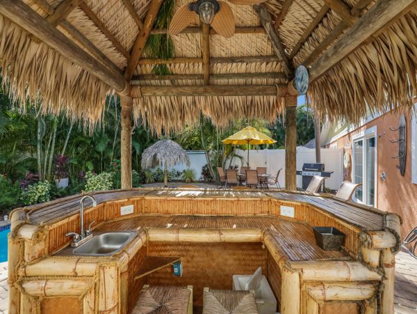 Tiki Cottage steps from the beach